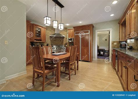 How Would You Describe a Window in the Kitchen Eating Area, and What Does It Say About the Space It Occupies?